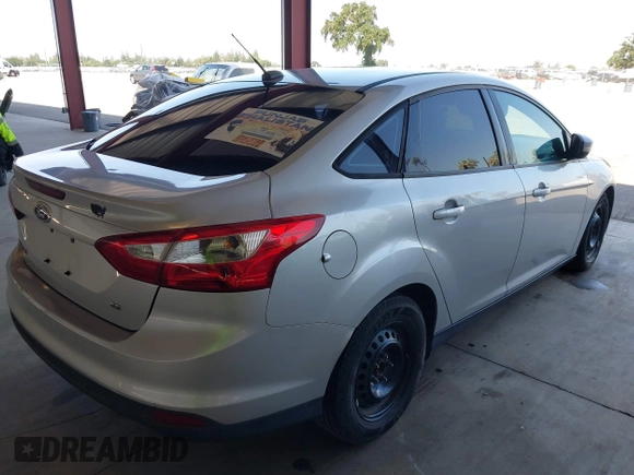 2013 Ford Focus SE with VIN 1FADP3F27DL375465, listed as a IAAI auction lot 42170250 with 123,427 mi miles. Bid and sale history available at carsss.com. Image 4.