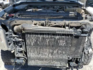 2010 Ford F-350 XL z VIN 1FTWW3DR4AEA53081, wystawiony jako Copart lot #67385594 z przebiegiem 190 666 mil mil oraz Szkoda całkowita • Salvage title. Historia ofert i sprzedaży dostępna na DreamBid. Obrazek 11.