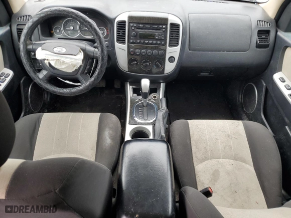 2007 Mercury Mariner Luxury with VIN 4M2YU91107KJ07772, listed as a Copart auction lot 42867545 with 128,235 mi miles and Salvage Title. Bid and sale history available at carsss.com. Image 8.