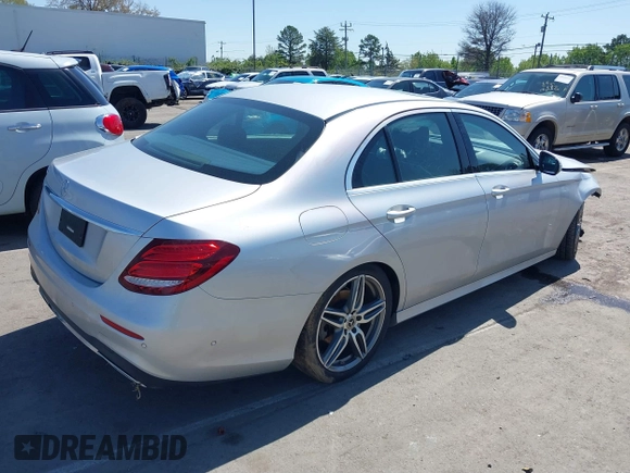2018 Mercedes-Benz E-Class E 300 with VIN WDDZF4JB0JA472648, listed as a IAAI auction lot 41843995 with 128,590 mi miles. Bid and sale history available at carsss.com. Image 4.