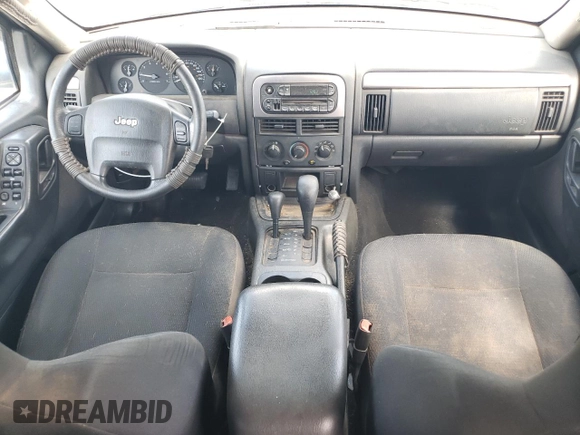 2004 Jeep Grand Cherokee Laredo z VIN 1J4GW48S84C177274, wystawiony jako Copart lot #56468855 z przebiegiem 236 014 mil mil oraz Szkoda całkowita • Salvage title. Historia ofert i sprzedaży dostępna na DreamBid. Obrazek 8.