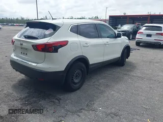 2019 Nissan Rogue S with VIN JN1BJ1CP2KW238844, listed as a IAAI auction lot 41997484 with 105,464 mi miles and . Bid and sale history available at DreamBid. Image 4.