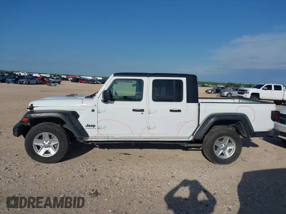 2023 Jeep Gladiator Sport S с VIN 1C6HJTAG0PL533933, выставлен на аукционе IAAI как лот 42351470 с пробегом 57 982 миль миль и . История ставок и продаж доступна на DreamBid. Изображение 14.