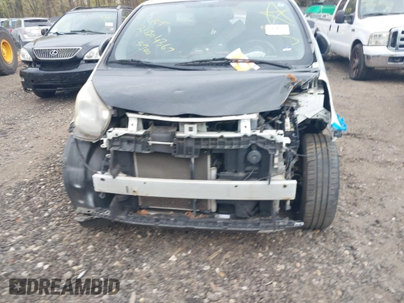 2013 Scion iQ with VIN JTNJJXB06DJ022801, listed as a IAAI auction lot 42152740 with Not provided miles and . Bid and sale history available at DreamBid. Image 6.