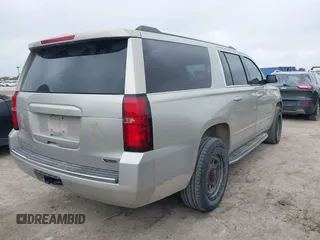 2017 Chevrolet Suburban Premier with VIN 1GNSCJKC4HR183592, listed as a IAAI auction lot 41514348 with 144,460 mi miles and . Bid and sale history available at DreamBid. Image 4.