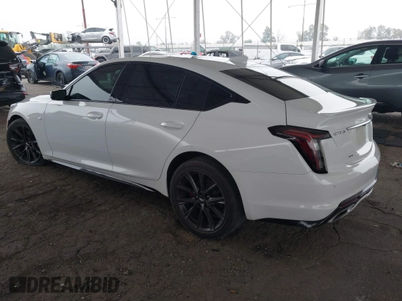 2021 Cadillac CT5 Sport z VIN 1G6DU5RK9M0117981, wystawiony jako IAAI lot #42021432 z przebiegiem 67 363 mil mil oraz . Historia ofert i sprzedaży dostępna na DreamBid. Obrazek 3.