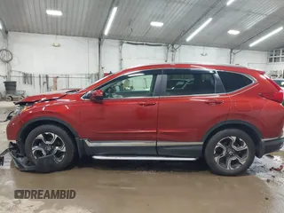 2017 Honda CR-V Touring with VIN 2HKRW2H95HH610401, listed as a IAAI auction lot 42177024 with 42,494 mi miles and . Bid and sale history available at carsss.com. Image 14.