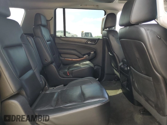 2015 Chevrolet Suburban LTZ with VIN 1GNSCKKC9FR151532, listed as a Copart auction lot 54209315 with 122,380 mi miles and Salvage title. Bid and sale history available at DreamBid. Image 11.