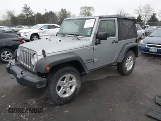 2015 Jeep Wrangler Sport with VIN 1C4AJWAG6FL501160, listed as a IAAI auction lot 41941661 with 134,842 mi miles. Bid and sale history available at carsss.com. Image 2.