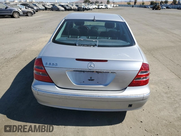 2003 Mercedes-Benz E-Class 3.2L with VIN WDBUF65JX3A096821, listed as a Copart auction lot 74378684 with 157,088 mi miles and Clean Title. Bid and sale history available at carsss.com. Image 6.