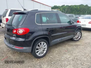 2011 Volkswagen Tiguan SEL with VIN WVGBV7AX6BW521525, listed as a IAAI auction lot 42490216 with 123,546 mi miles and . Bid and sale history available at DreamBid. Image 4.