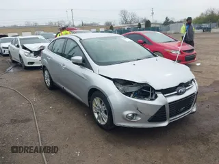 2012 Ford Focus SEL with VIN 1FAHP3H28CL266719, listed as a IAAI auction lot 42008714 with 169,880 mi miles. Bid and sale history available at carsss.com. Image 1.