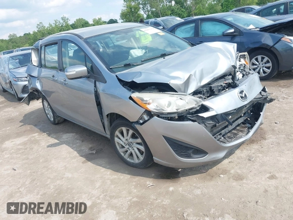 2014 Mazda 5 Sport with VIN JM1CW2BL6E0164195, listed as a IAAI auction lot 42455158 with 155,007 mi miles and . Bid and sale history available at DreamBid. Image 1.