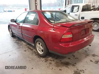 1994 Honda Accord LX with VIN 1HGCD563XRA131476, listed as a IAAI auction lot 41848998 with 109,243 mi miles. Bid and sale history available at carsss.com. Image 3.