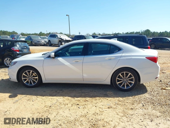 2018 Acura TLX with VIN 19UUB1F32JA000355, listed as a IAAI auction lot 41785280 with 120,023 mi miles and . Bid and sale history available at DreamBid. Image 14.