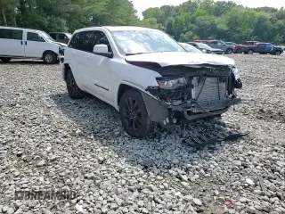 2018 Jeep Grand Cherokee Altitude with VIN 1C4RJFAGXJC122688, listed as a Copart auction lot 61290525 with 106,671 mi miles and Salvage title. Bid and sale history available at DreamBid. Image 14.