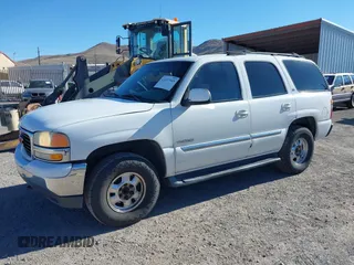 2002 GMC Yukon SLT z VIN 1GKEC13T32R256757, wystawiony jako IAAI lot #41657945 z przebiegiem 331 831 mil mil oraz . Historia ofert i sprzedaży dostępna na DreamBid. Obrazek 2.