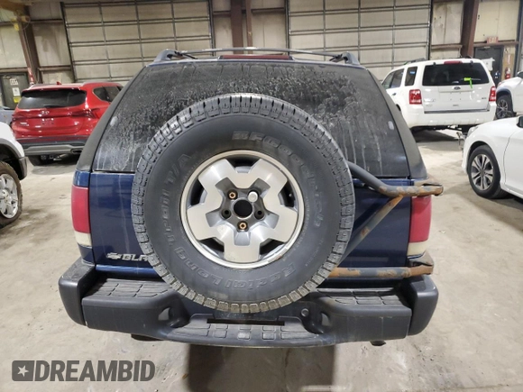 2001 Chevrolet Blazer LS z VIN 1GNCT18W01K143093, wystawiony jako Copart lot #82650514 z przebiegiem Nie podano mil oraz Szkoda całkowita • Salvage title. Historia ofert i sprzedaży dostępna na DreamBid. Obrazek 6.