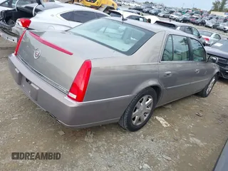 2007 Cadillac DTS Luxury I z VIN 1G6KD57Y97U168196, wystawiony jako IAAI lot #41463856 z przebiegiem 167 875 mil mil oraz . Historia ofert i sprzedaży dostępna na DreamBid. Obrazek 4.