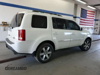 2014 Honda Pilot Touring z VIN 5FNYF4H99EB011079, wystawiony jako Copart lot #57869765 z przebiegiem Nie podano mil oraz Szkoda całkowita • Salvage title. Historia ofert i sprzedaży dostępna na DreamBid. Obrazek 3.