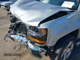 2018 Chevrolet Silverado 1500 LT with VIN 1GCRCREC0JZ212383, listed as a IAAI auction lot 41749534 with 45,777 mi miles and . Bid and sale history available at DreamBid. Image 6.