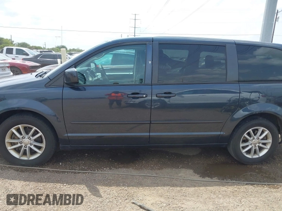 2013 Dodge Grand Caravan SXT with VIN 2C4RDGCGXDR749803, listed as a IAAI auction lot 42118722 with 264,454 mi miles and . Bid and sale history available at DreamBid. Image 14.