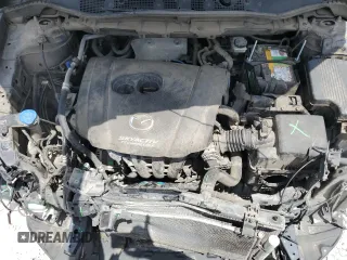 2014 Mazda CX-5 Sport z VIN JM3KE2BE8E0421316, wystawiony jako Copart lot #56548005 z przebiegiem 203 096 mil mil oraz Szkoda całkowita • Salvage title. Historia ofert i sprzedaży dostępna na DreamBid. Obrazek 11.