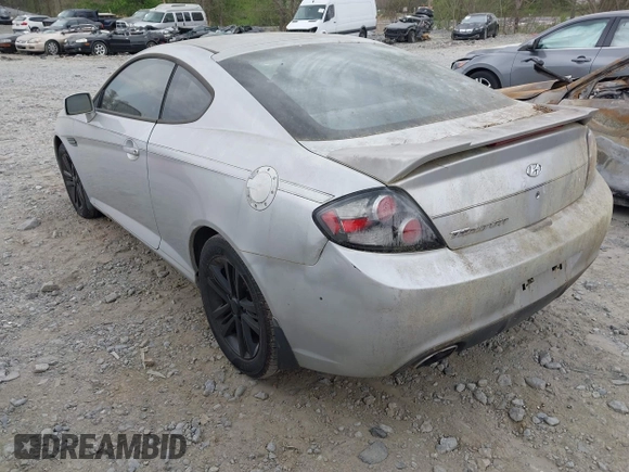 2008 Hyundai Tiburon GS z VIN KMHHM66D68U264666, wystawiony jako IAAI lot #41970123 z przebiegiem 186 448 mil mil oraz . Historia ofert i sprzedaży dostępna na DreamBid. Obrazek 3.