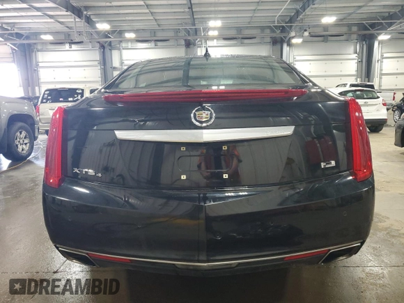 2014 Cadillac XTS Luxury z VIN 2G61N5S35E9133430, wystawiony jako Copart lot #54746235 z przebiegiem 157 544 mil mil oraz Szkoda całkowita • Salvage title. Historia ofert i sprzedaży dostępna na DreamBid. Obrazek 6.