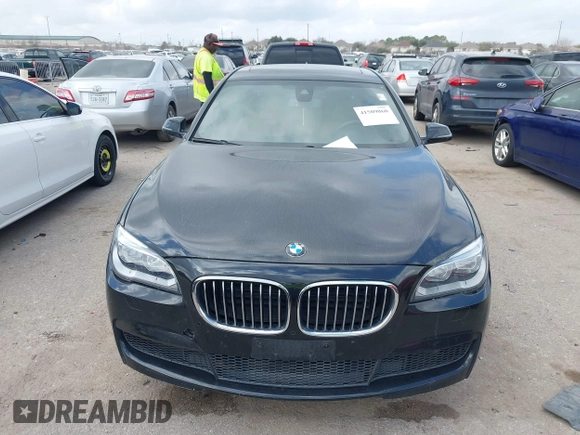 2013 BMW 7 Series 750Li with VIN WBAYE8C55DD133178, listed as a IAAI auction lot 41509860 with 90,841 mi miles and . Bid and sale history available at DreamBid. Image 12.