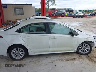2023 Toyota Corolla Hybrid LE with VIN JTDBCMFE8P3012027, listed as a IAAI auction lot 41517460 with 4,424 mi miles. Bid and sale history available at carsss.com. Image 13.