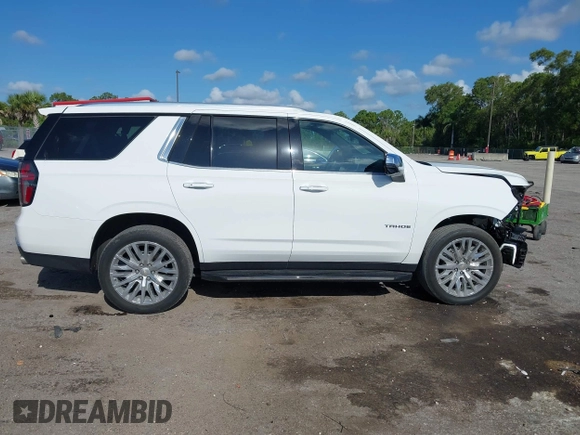2023 Chevrolet Tahoe Premier with VIN 1GNSKSKD0PR453465, listed as a IAAI auction lot 42512099 with 23,252 mi miles and . Bid and sale history available at DreamBid. Image 14.