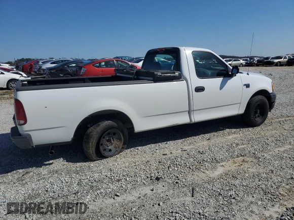 2003 Ford F-150 XL with VIN 2FTRF17WX3CB10461, listed as a Copart auction lot 48663195 with 94,954 mi miles and Salvage Title. Bid and sale history available at DreamBid. Image 3.