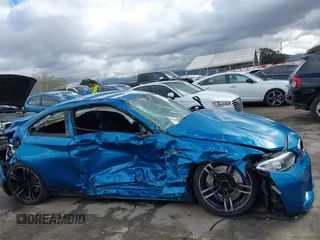 2017 BMW M2 z VIN WBS1H9C53HV887089, wystawiony jako IAAI lot #41731841 z przebiegiem 57 509 mil mil oraz . Historia ofert i sprzedaży dostępna na DreamBid. Obrazek 13.