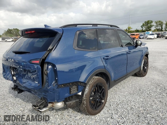 2024 Kia Telluride EX with VIN 5XYP3DGC1RG471384, listed as a Copart auction lot 59708035 with 8,388 mi miles and Salvage title. Bid and sale history available at DreamBid. Image 3.