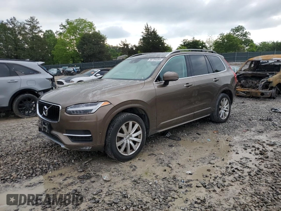 2016 Volvo XC90 T6 Momentum z VIN YV4A22PK6G1032633, wystawiony jako Copart lot #56704495 z przebiegiem 179 836 mil mil oraz Tytuł czysty. Historia ofert i sprzedaży dostępna na DreamBid. Obrazek 1.
