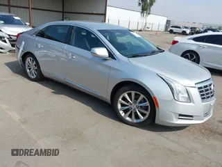 2014 Cadillac XTS Luxury with VIN 2G61N5S30E9294994, listed as a IAAI auction lot 42617654 with 159,573 mi miles and . Bid and sale history available at DreamBid. Image 1.