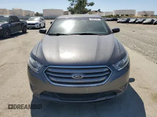 2015 Ford Taurus SEL with VIN 1FAHP2E8XFG209390, listed as a Copart auction lot 58992305 with 99,498 mi miles and Salvage title. Bid and sale history available at DreamBid. Image 5.