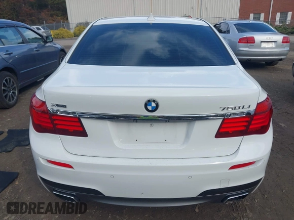 2015 BMW 7 Series 750Li xDrive with VIN WBAYF8C56FD654765, listed as a IAAI auction lot 40734550 with 133,848 mi miles and . Bid and sale history available at carsss.com. Image 16.