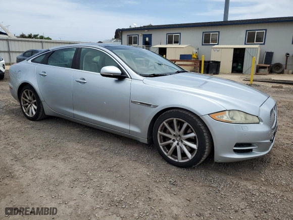 2011 Jaguar XJ with VIN SAJWA1CB9BLV05595, listed as a Copart auction lot 54947855 with 39,516 mi miles and Salvage Title. Bid and sale history available at carsss.com. Image 4.