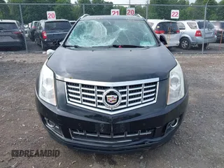 2015 Cadillac SRX Performance Collection with VIN 3GYFNFE35FS591343, listed as a IAAI auction lot 42644949 with 118,718 mi miles and . Bid and sale history available at DreamBid. Image 13.