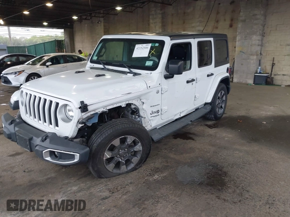 2018 Jeep Wrangler Unlimited Sahara with VIN 1C4HJXEG3JW116404, listed as a IAAI auction lot 42152506 with 57,727 mi miles and . Bid and sale history available at DreamBid. Image 17.