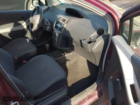 2009 Toyota Yaris with VIN JTDKT903X95258654, listed as a IAAI auction lot 41759756 with 93,810 mi miles. Bid and sale history available at carsss.com. Image 5.