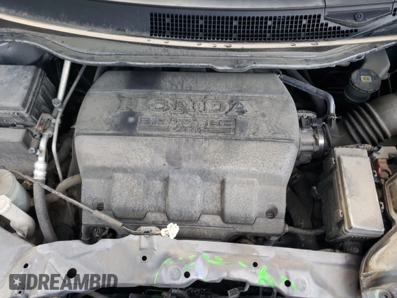 2014 Honda Odyssey Touring z VIN 5FNRL5H98EB512144, wystawiony jako Copart lot #69987533 z przebiegiem 184 231 mil mil oraz Szkoda całkowita • Salvage title. Historia ofert i sprzedaży dostępna na DreamBid. Obrazek 12.