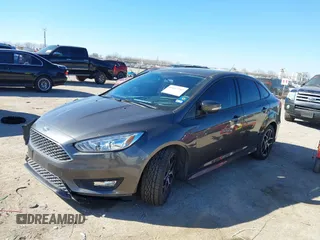 2016 Ford Focus SE with VIN 1FADP3F21GL262907, listed as a IAAI auction lot 41657582 with 62,789 mi miles. Bid and sale history available at carsss.com. Image 2.