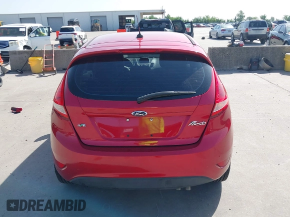 2012 Ford Fiesta SE z VIN 3FADP4EJ9CM140948, wystawiony jako IAAI lot #42301818 z przebiegiem 109 276 mil mil oraz . Historia ofert i sprzedaży dostępna na DreamBid. Obrazek 17.
