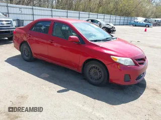 2012 Toyota Corolla L with VIN 5YFBU4EE4CP059104, listed as a IAAI auction lot 42124080 with 336,674 mi miles. Bid and sale history available at carsss.com. Image 1.