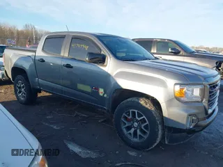 2021 GMC Canyon 4WD AT4 z VIN 1GTG6FEN2M1265488, wystawiony jako IAAI lot #41747348 z przebiegiem 69 074 mil mil oraz . Historia ofert i sprzedaży dostępna na DreamBid. Obrazek 1.