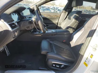 2017 BMW 7 Series 750i with VIN WBA7F0C39HGM22030, listed as a Copart auction lot 87127484 with 110,634 mi miles and Salvage title. Bid and sale history available at DreamBid. Image 7.