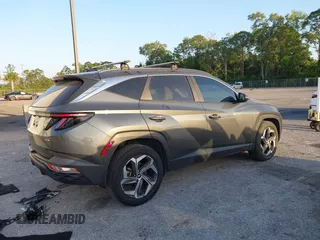 2022 Hyundai Tucson SEL z VIN 5NMJCCAE0NH149457, wystawiony jako IAAI lot #42166988 z przebiegiem 51 930 mil mil oraz . Historia ofert i sprzedaży dostępna na DreamBid. Obrazek 4.
